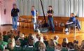 Paul, Thomas, Declan and Denise talk to the pupils